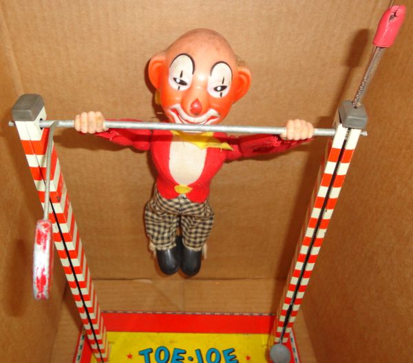 Battery Operated ACROBAT CLOWN 1960s mechanical tin litho & plastic CIRCUS performer For Discount