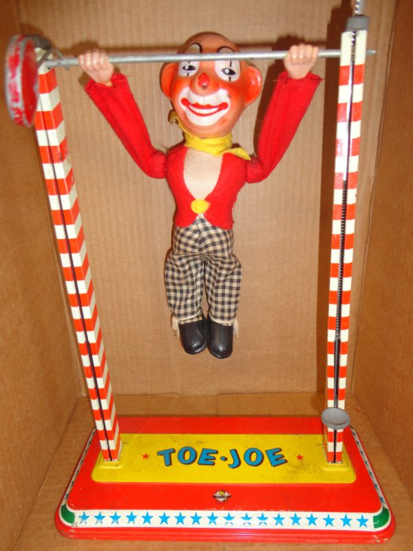 Battery Operated ACROBAT CLOWN 1960s mechanical tin litho & plastic CIRCUS performer For Discount